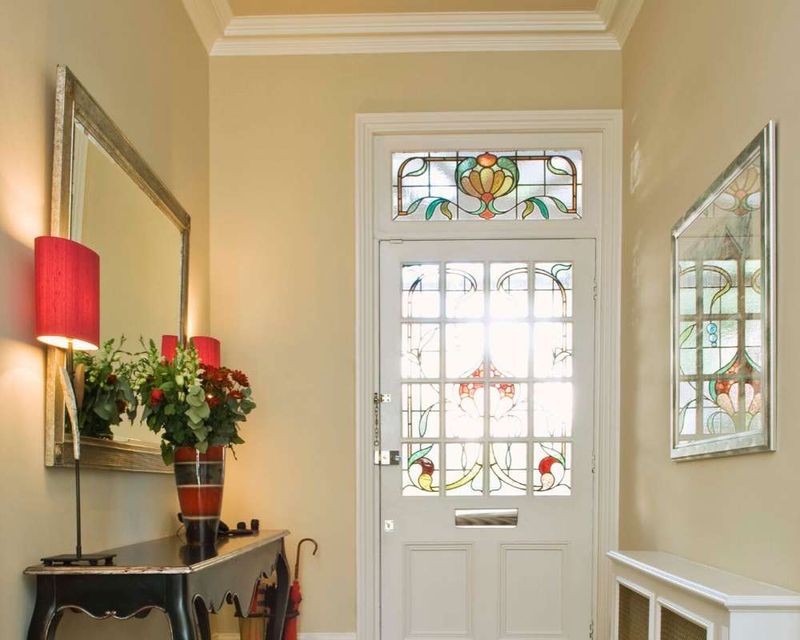 Mirrors facing the front door
