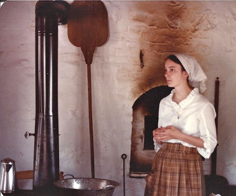 Women Baking Bread In Outdoor Ovens