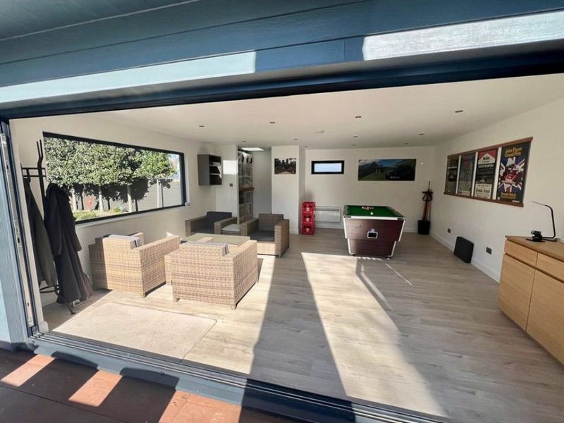 Entertainment Space with Foldable Walls